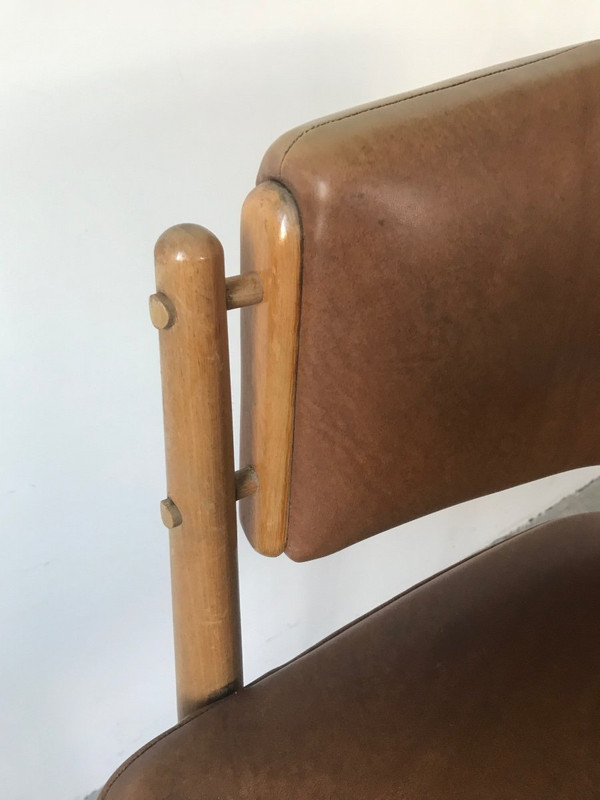 Brown leatherette armchair circa 1950.