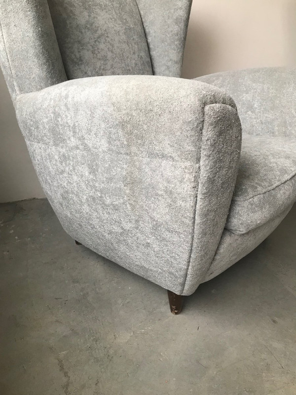 Pair of Italian armchairs in the style of Jean Royère in pearl gray velvet.