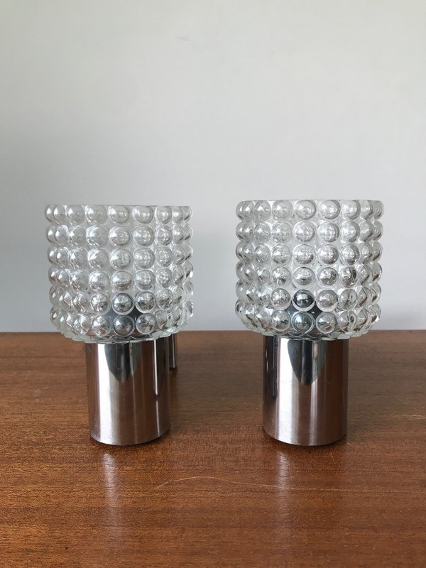 Pair of chrome and glass sconces, circa 1970.