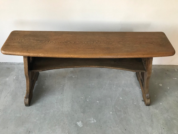 Art and Crafts style organ bench in solid oak.