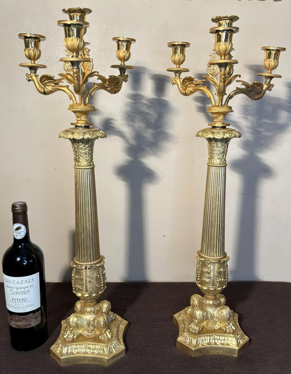 Large pair of candelabra (Flambeaux) in gilded bronze from the beginning of the 19th century.