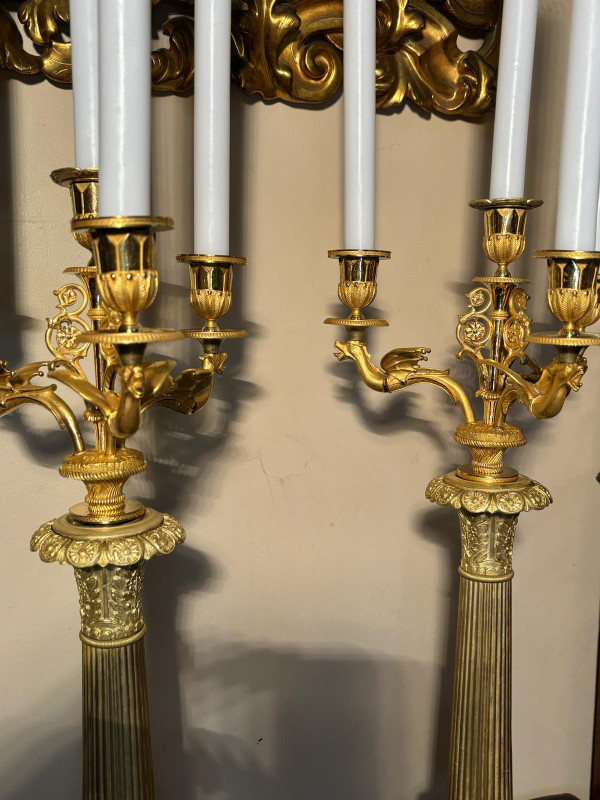 Large pair of candelabra (Flambeaux) in gilded bronze from the beginning of the 19th century.