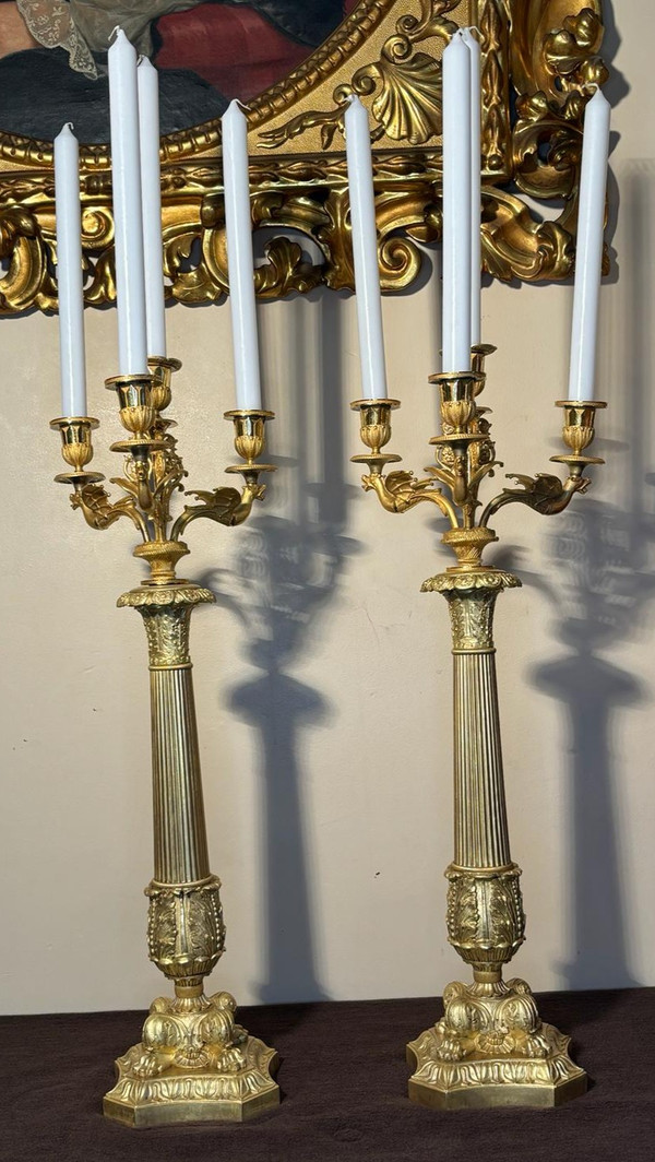 Large pair of candelabra (Flambeaux) in gilded bronze from the beginning of the 19th century.