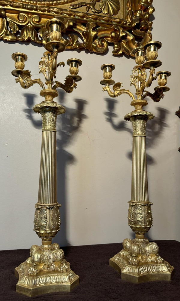 Large pair of candelabra (Flambeaux) in gilded bronze from the beginning of the 19th century.