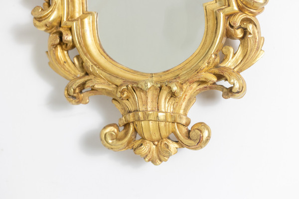 Regency style mirror in carved and gilded wood. 1950s.