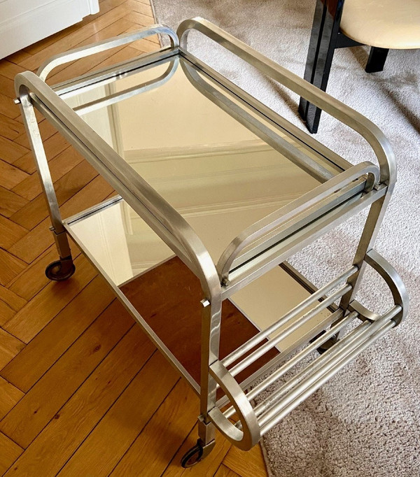 France, 1950s/60s, Aluminum Caster Table And Its Removable Jacques Adnet Style Top.