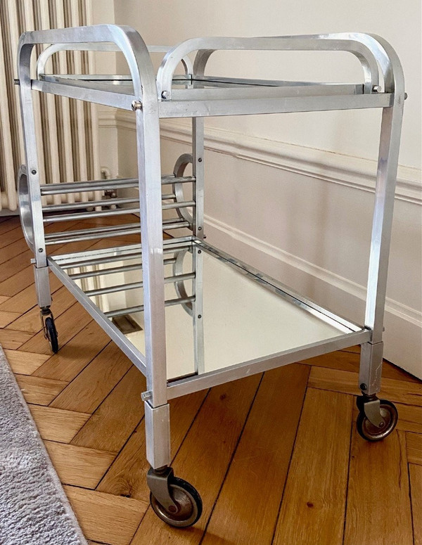 France, 1950s/60s, Aluminum Caster Table And Its Removable Jacques Adnet Style Top.