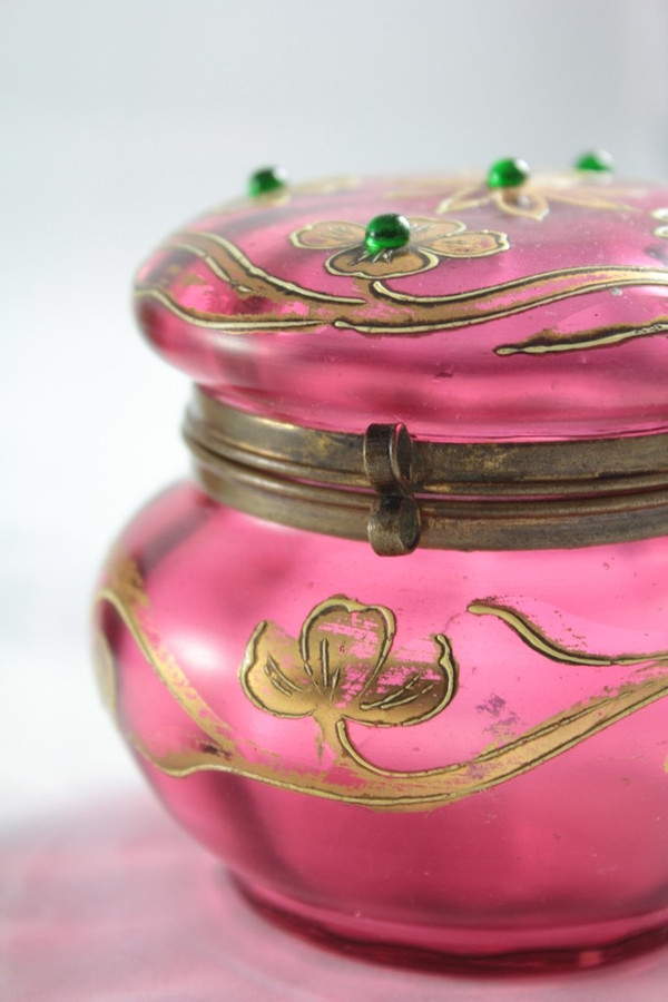 Pink glass box decorated with enamel, gilding and cabochons circa 1900