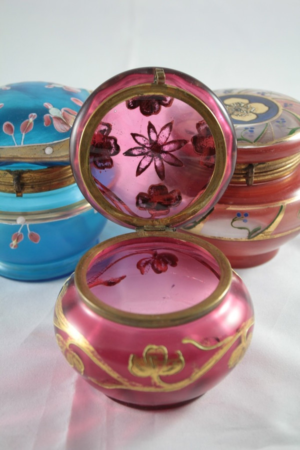 Pink glass box decorated with enamel, gilding and cabochons circa 1900