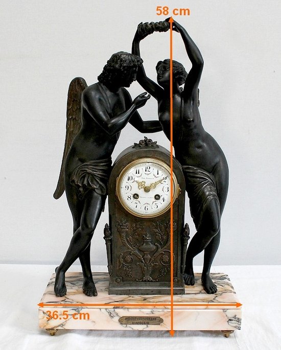  Pendolo in spelter "Psiche che incorona l'amore" secondo Claude Michallon - 1900