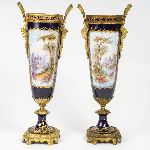 A pair of late 19th century sèvres blue porcelain vases