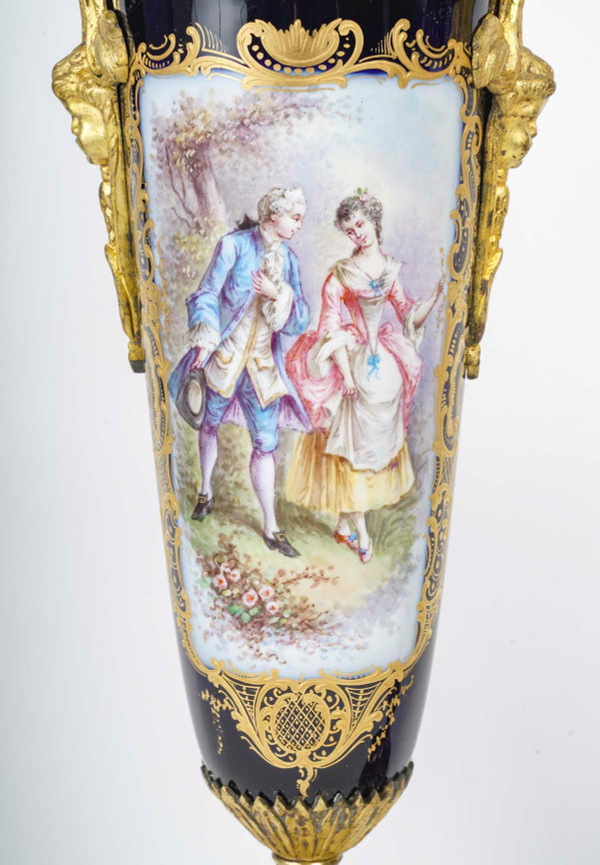 A pair of late 19th century sèvres blue porcelain vases