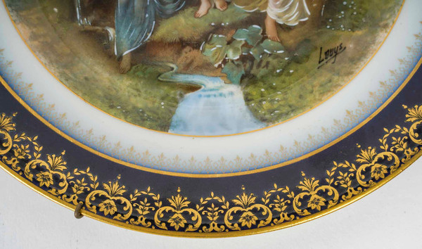 A pair of Limoge porcelain plates, early 20th century