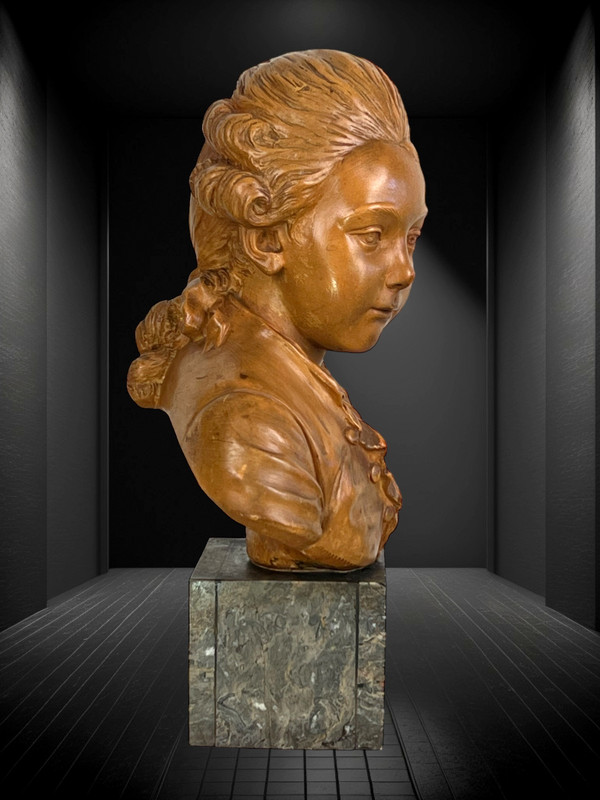 BUST OF A CHILD AFTER "PAJOU" SUBJECT IN TERRACOTTA ON MARBLE BASE