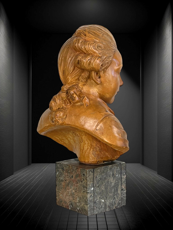 BUST OF A CHILD AFTER "PAJOU" SUBJECT IN TERRACOTTA ON MARBLE BASE