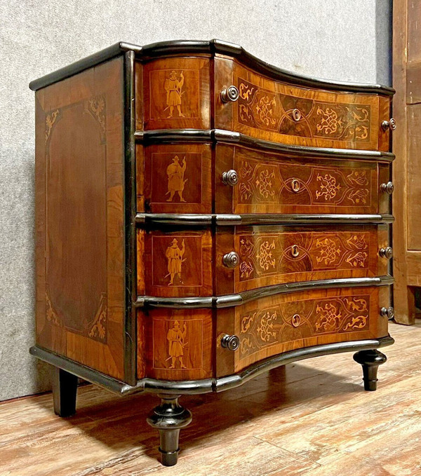 Baroque Louis XV period chest of drawers in blackened wood and marquetry circa 1750