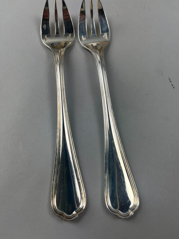 Twelve Christofle spatour oyster forks