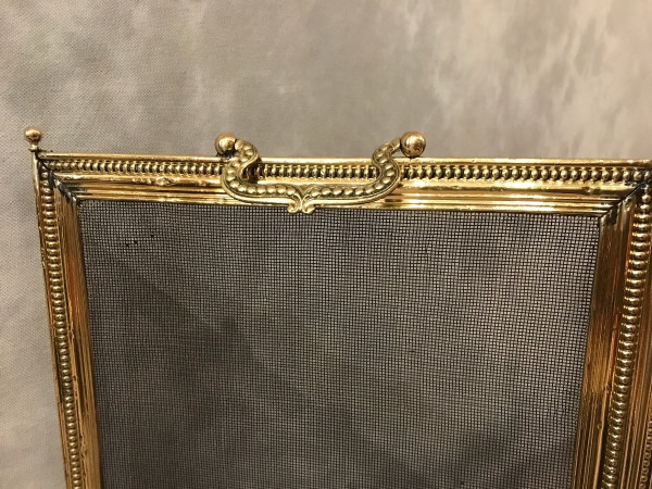 Antique Louis XVI style brass fireplace surround