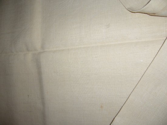 Old embroidered sheet in monogrammed linen