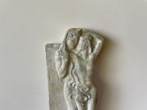 Plaster bas-relief representing Adam and Eve.