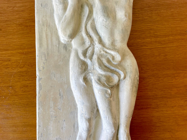 Plaster bas-relief representing Adam and Eve.