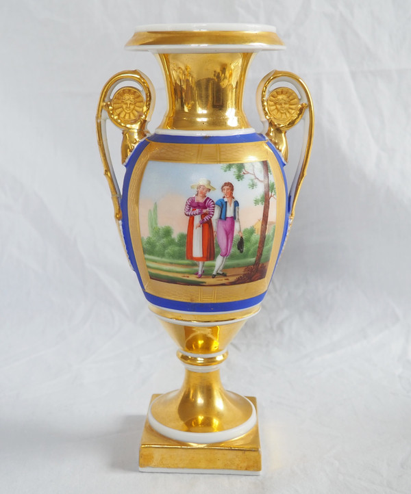 Pair of Empire period vases in Paris porcelain and biscuit, blue and gold polychrome decoration