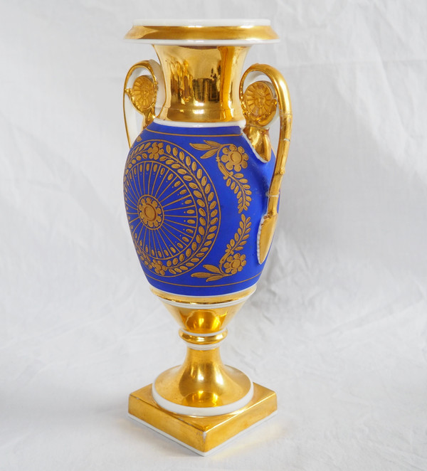 Pair of Empire period vases in Paris porcelain and biscuit, blue and gold polychrome decoration