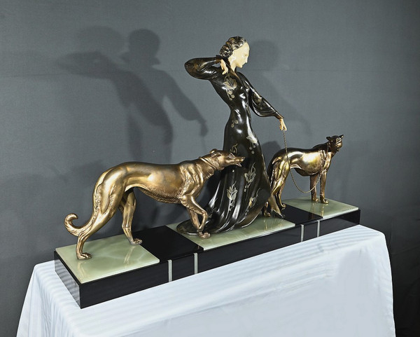 Grande scultura "En Promenade", firmata Menneville et Rochard - 1930