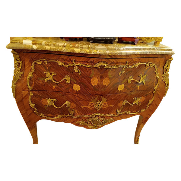 A Louis XV chest of drawers, early 21st century