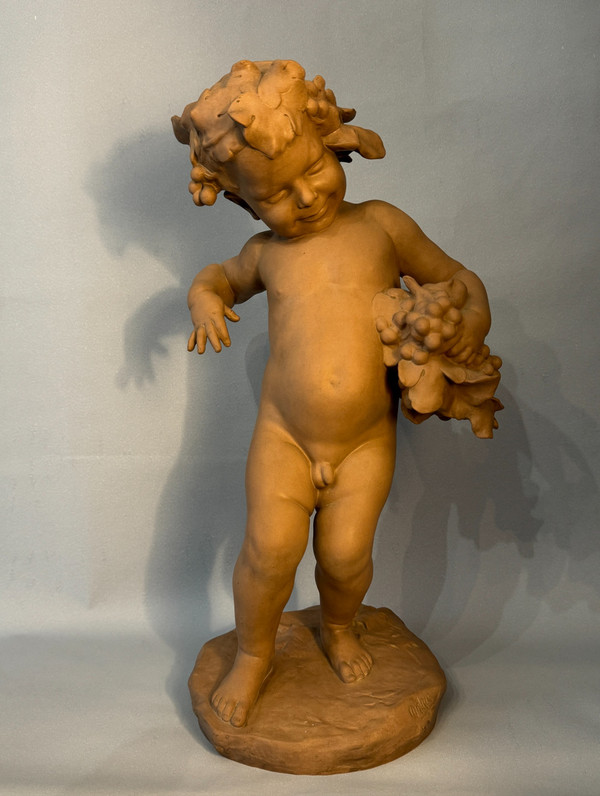 Sculpture Terre cuite de SEVRES "Bacchus enfant" signé MALRIC 