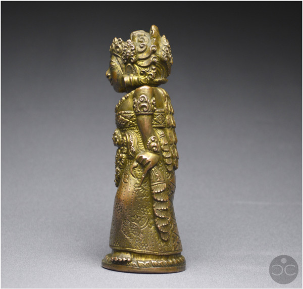 Indonesia, Bali, 16th - 17th century, Anthropomorphic kriss handle in copper alloy