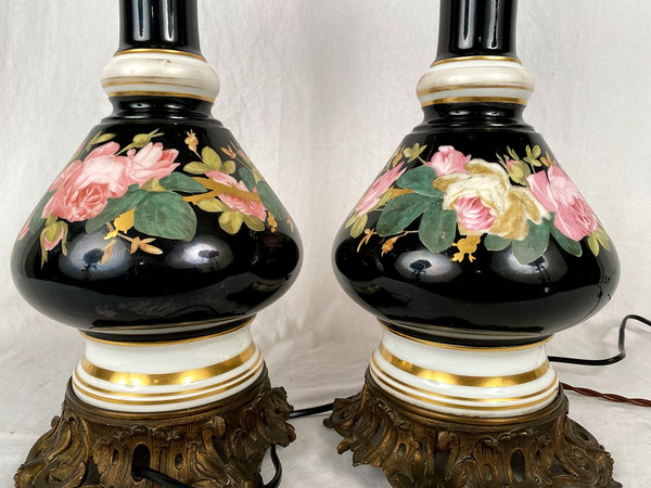 Pair of electrically mounted kerosene lamps, porcelain decorated with roses