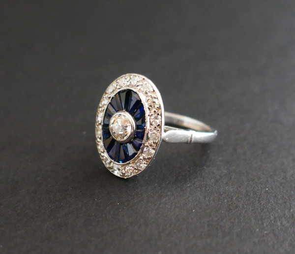 Art Deco Ring with Calibrated Diamonds and Sapphires, Platinum.