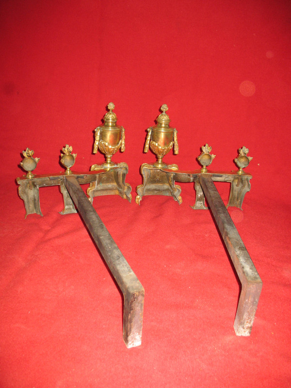 Pair of Louis XVI bronze landier andirons from the early 19th century of rare quality