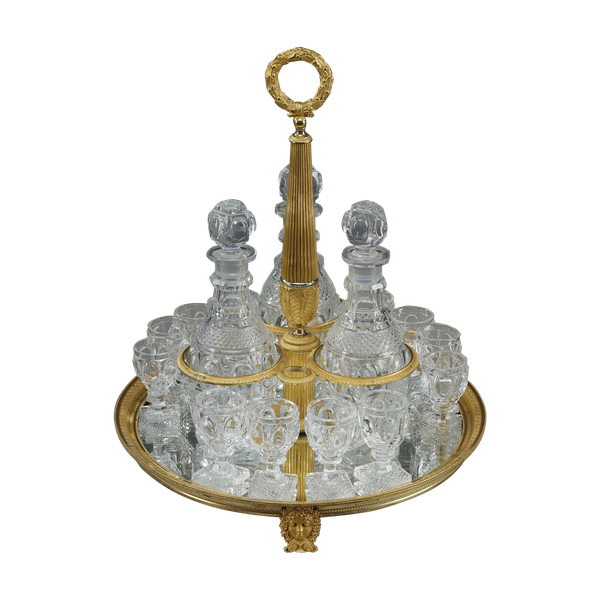 CHARLES X PERIOD LIQUOR SERVICE IN GILT BRONZE AND CUT CRYSTAL