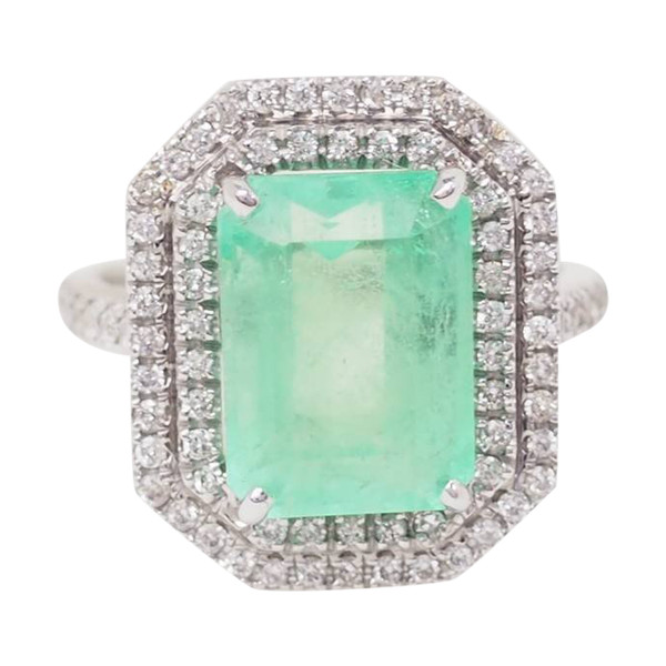 Double-encircled ring in white gold, certified Colombian emerald and diamonds