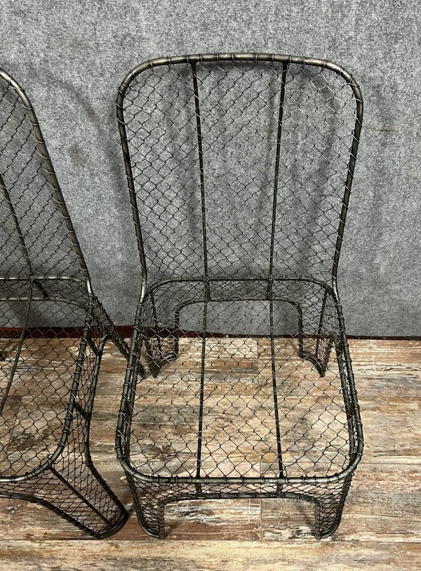 pair of industrial design chairs in wrought iron circa 1980