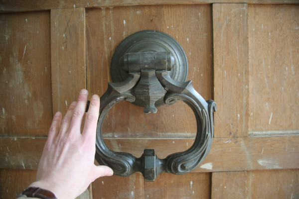 Large patinated bronze door knocker, late 17th century