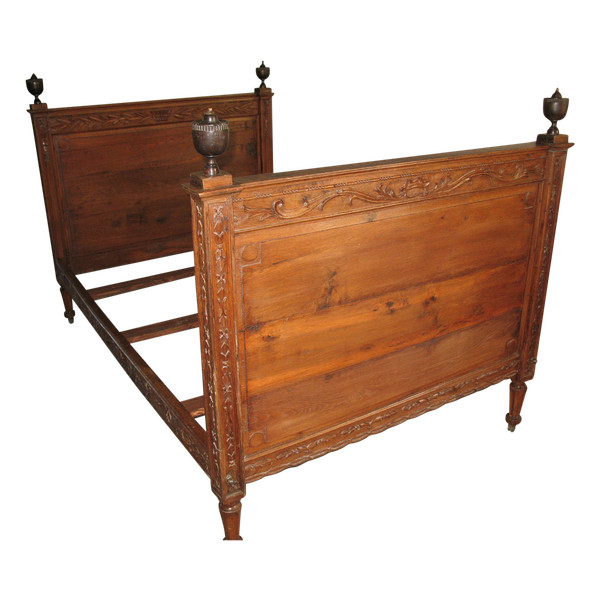 Late 18th century carved oak alcove bed complete with rails and casters