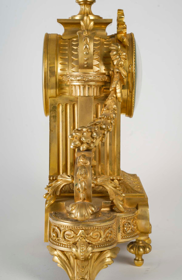 A Louis XVI Style Gilt Bronze Clock, 19th Century