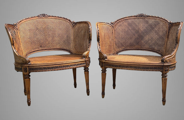 PAIRE DE GRANDS ET LARGES FAUTEUILS CANNÉS EN NOYER DU XIXe DE STYLE LOUIS XVI