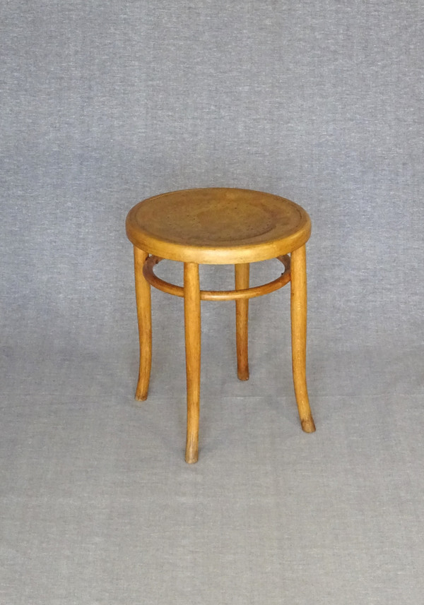 Low blond bistro stool, circa 1920, wooden seat