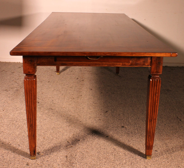 19th Century Cherry Wood Refectory Table With Louis XVI Caneled Legs