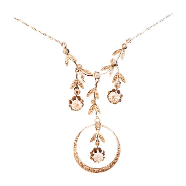 Drapery necklace set with diamonds.