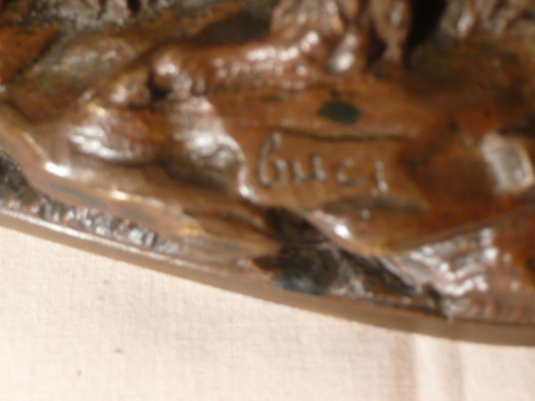 A bronze representing sheep signed Guci.