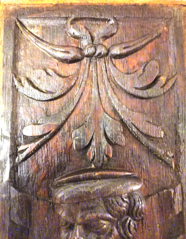 2 17th century carved oak panels representing man and woman