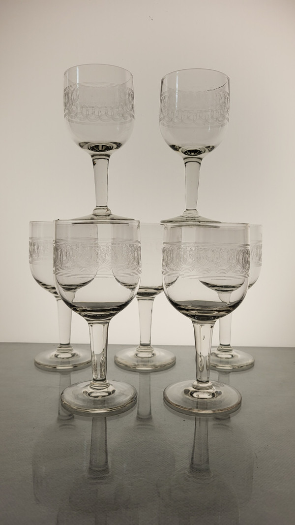 7 19th century guilloche wine glasses