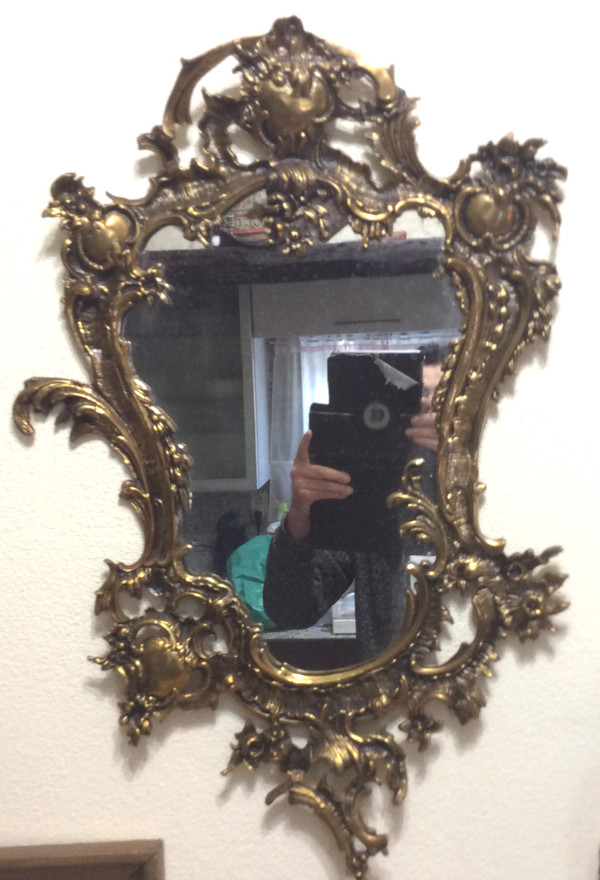 Louis XV style gilt bronze contour mirror