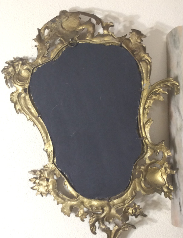 Louis XV style gilt bronze contour mirror