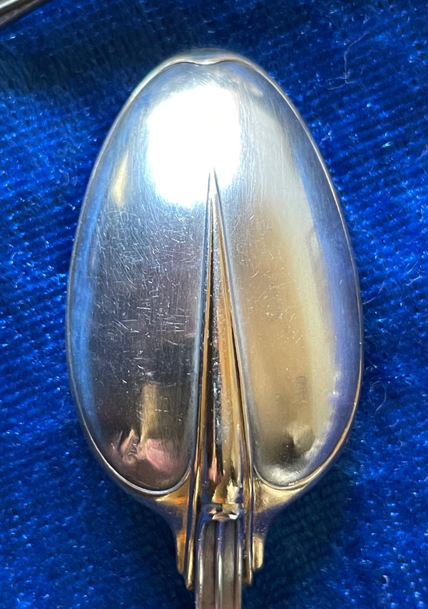 11 tea/coffee spoons.